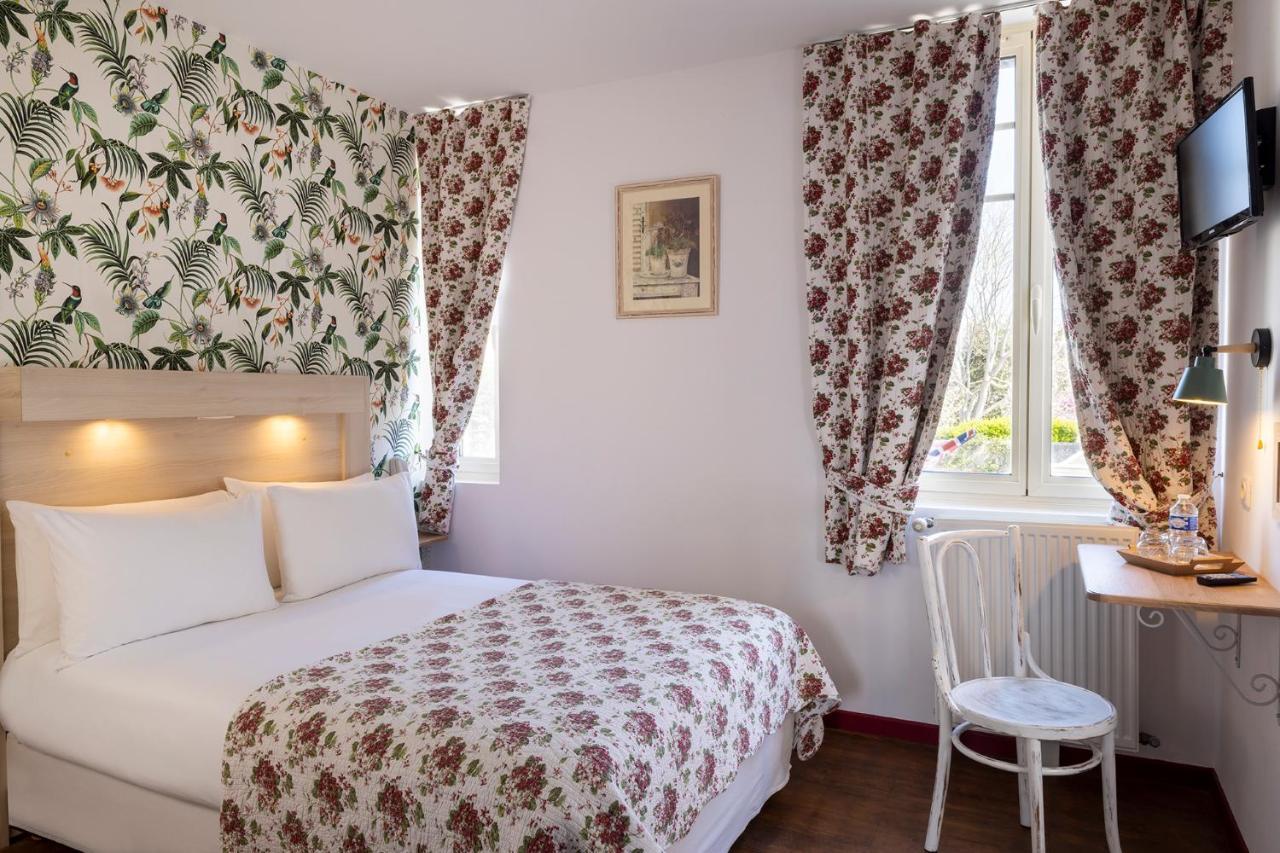 Hotel De Lion Sur Mer Buitenkant foto